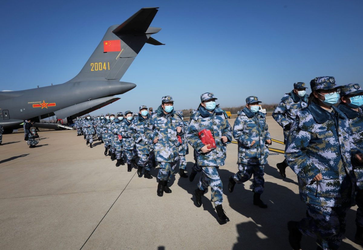 Medical personnel arrive in transport aircraft of the Chinese People’s Liberation Army (PLA) Air Force at the Wuhan Tianhe International Airport following the outbreak of the novel coronavirus in Wuhan