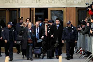FILE PHOTO: Film producer Harvey Weinstein exits New York Criminal Court following the fourth day of jury deliberations during his sexual assault trial in the Manhattan borough of New York City
