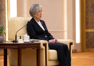 South Korean Foreign Minister Kang Kyung-wha speaks to Chinese  Premier Li Keqiang during their meeting with Japanese Foreign Minister Taro Kono (not pictured) at the Great Hall of the People (GHOP) in Beijing
