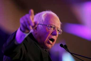 Democratic U.S. presidential candidate Sen. Bernie Sanders speaks with voters at the First in the South Dinner in Charleston