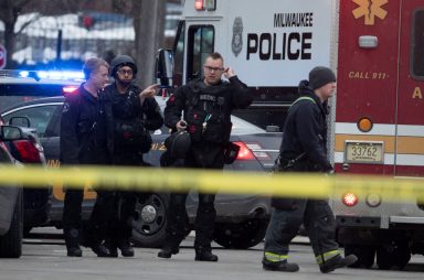 Police and emergency officials work at an active shooter scene at the Molson Coors headquarters in Milwaukee