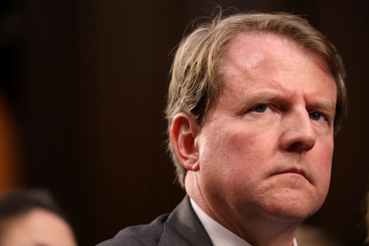 FILE PHOTO: White House Counsel Don McGahn listens during the confirmation hearing for U.S. Supreme Court nominee Kavanaugh on Capitol Hill in Washington