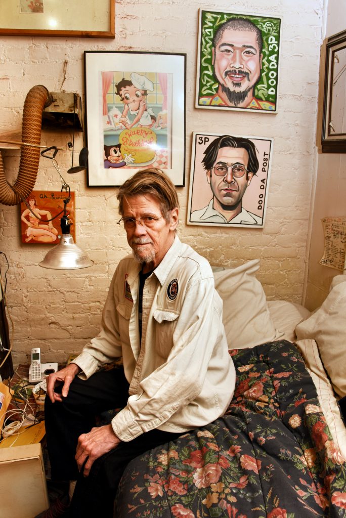 Ed Higgins III in his bedroom/studio, where he has lived since 1976