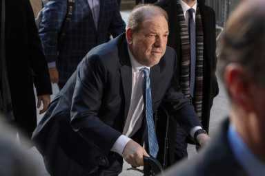 FILE PHOTO: Harvey Weinstein arrives at New York Criminal Court for another day of jury deliberations in his sexual assault trial in the Manhattan borough of New York City