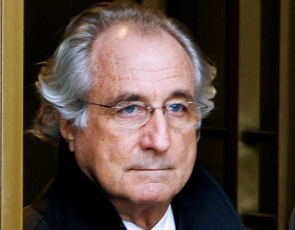 FILE PHOTO: File photo of Bernard Madoff exiting the Manhattan federal court house in New York