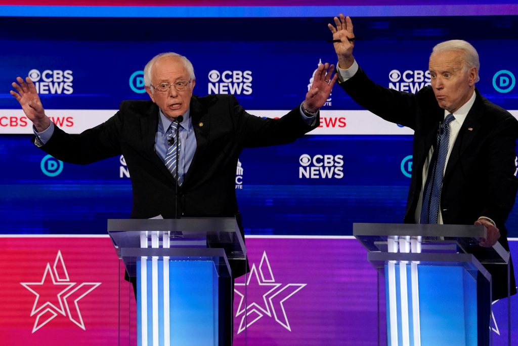 FILE PHOTO: Democratic 2020 U.S. presidential candidates Sanders and Biden participate in the tenth Democratic 2020 presidential debate at the Gaillard Center in Charleston, South Carolina