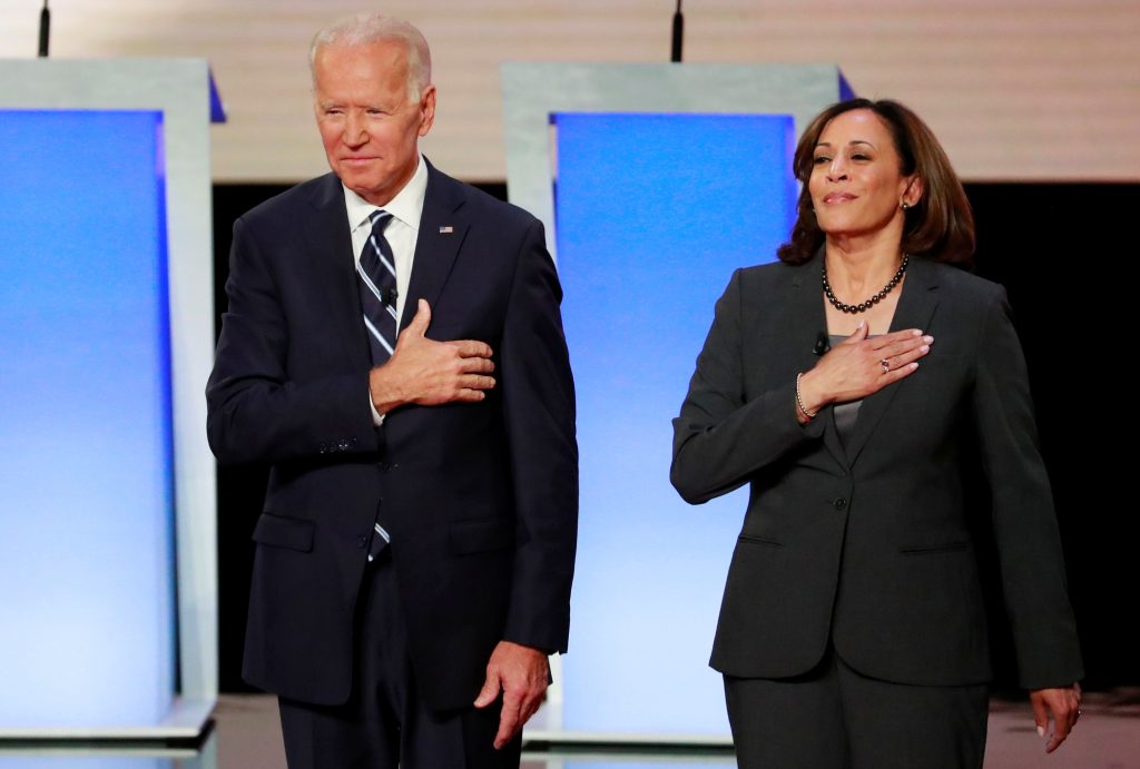 FILE PHOTO: Former Vice President  Biden and Senator Harris take the stage before the start of the second night of the second U.S. 2020 presidential Democratic candidates debate in Detroit, Michigan, U.S.
