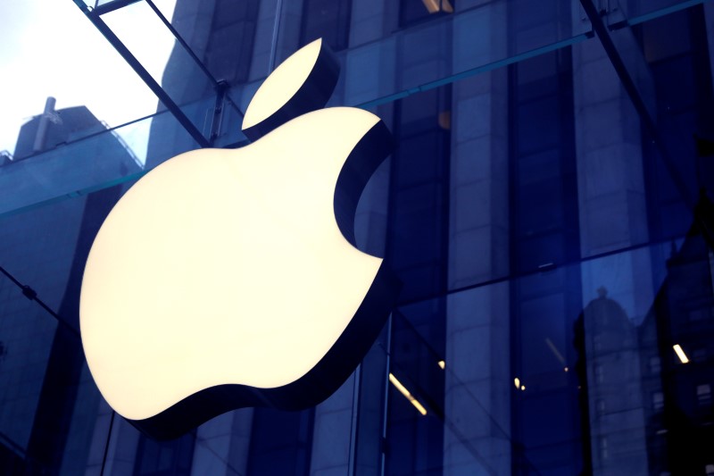 The Apple Inc. logo is seen hanging at the entrance to the Apple store on 5th Avenue in New York