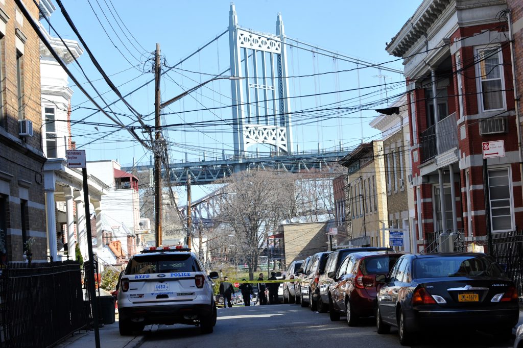 Cops at the scene of two people stabbed to death in Astoria, Que