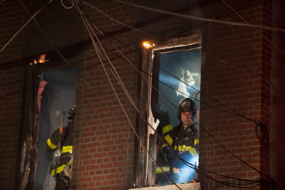 Firefighters rescued a woman from the second floor of an apartme