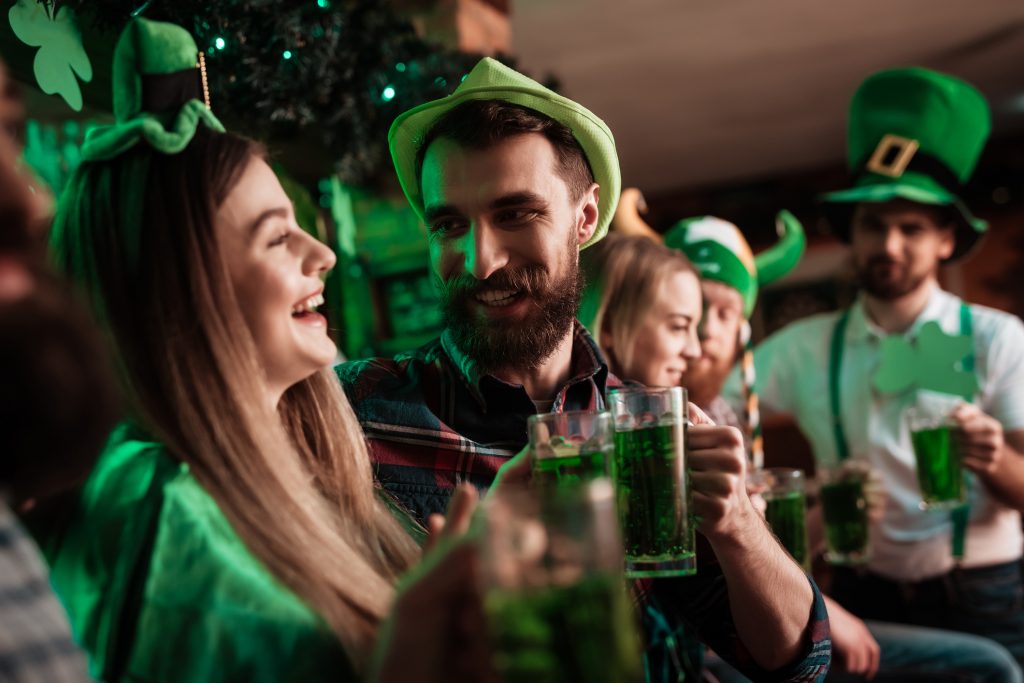 The company of young people celebrate St. Patrick’s Day.