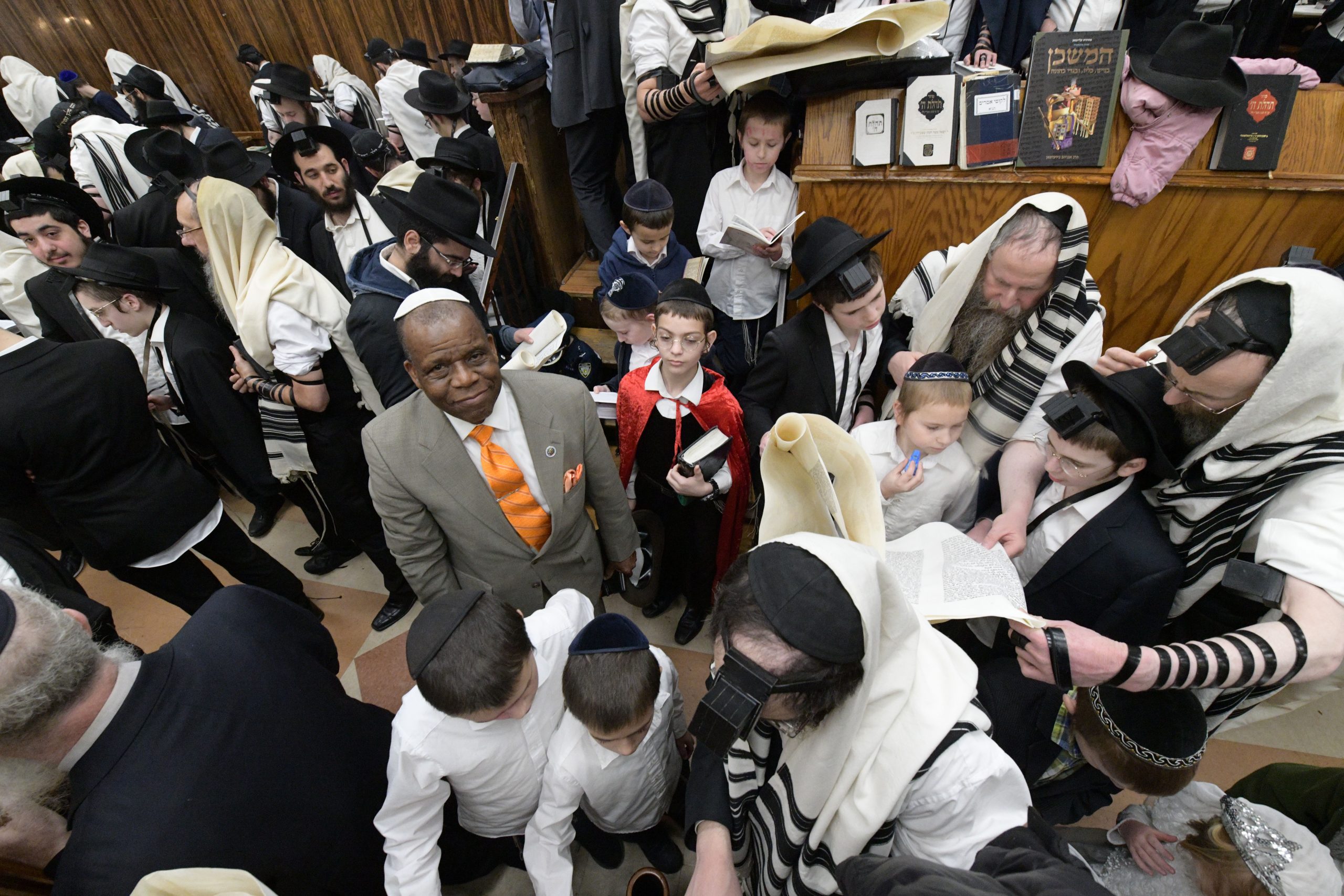 Despite coronavirus, Jewish residents in Brooklyn choose to celebrate Purim together 5