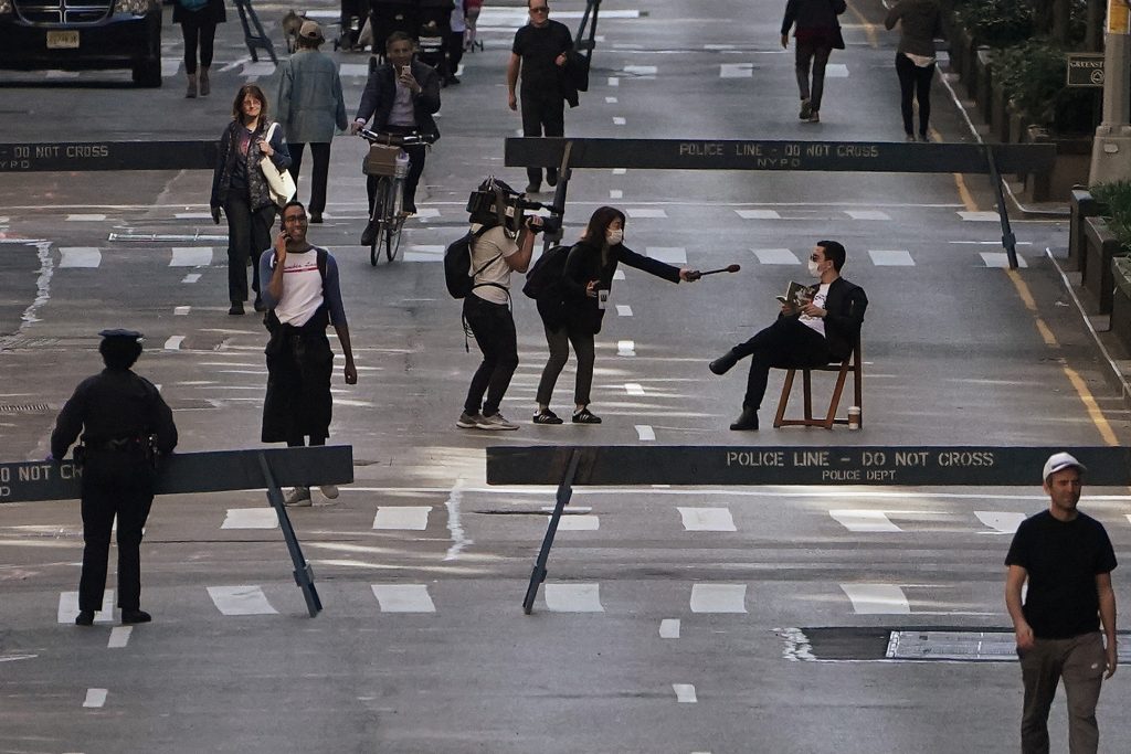 People walk on Park Avenue that was closed to vehicular traffic during the outbreak of coronavirus disease (COVID-19), in the Manhattan borough of New York City