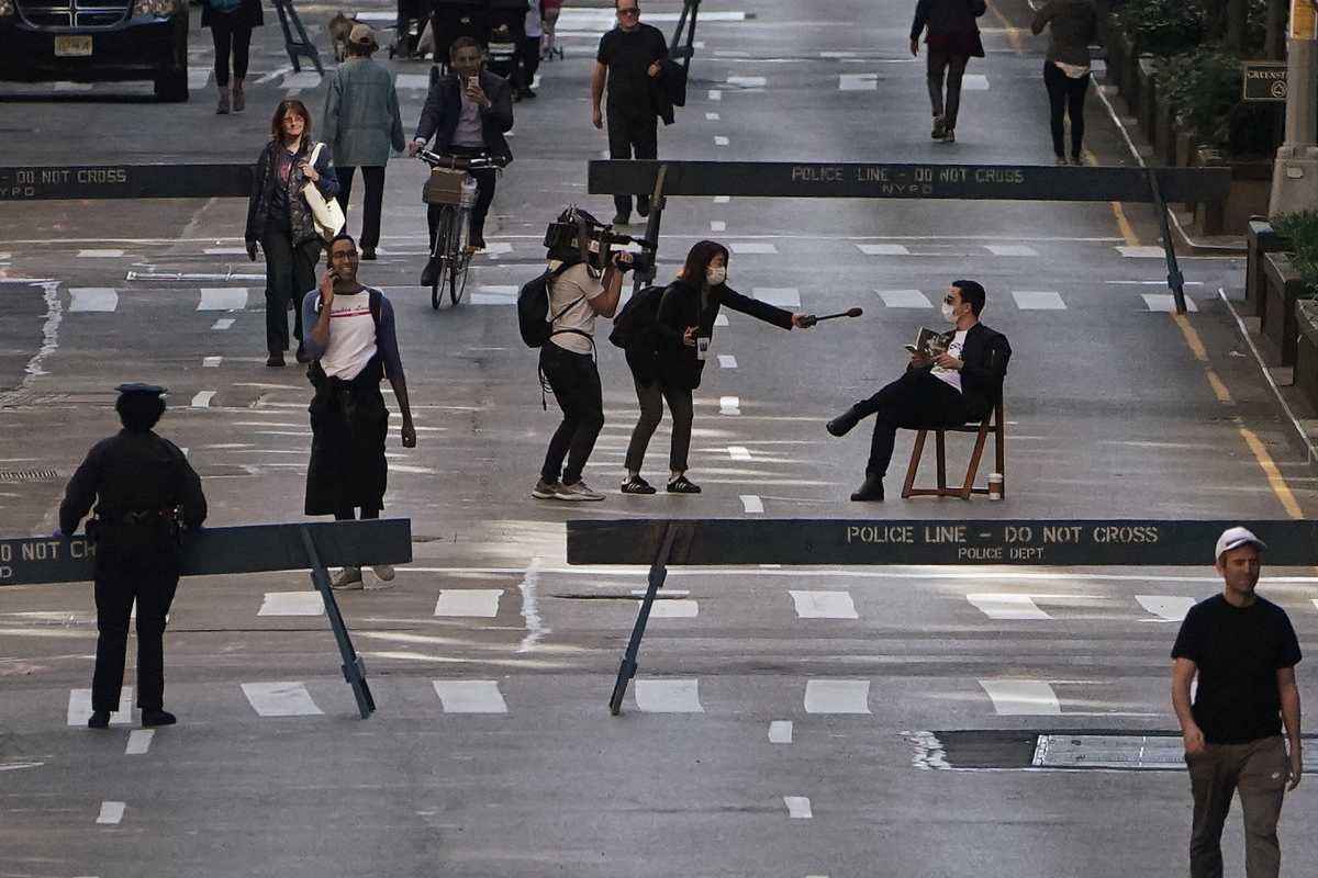 People walk on Park Avenue that was closed to vehicular traffic during the outbreak of coronavirus disease (COVID-19), in the Manhattan borough of New York City