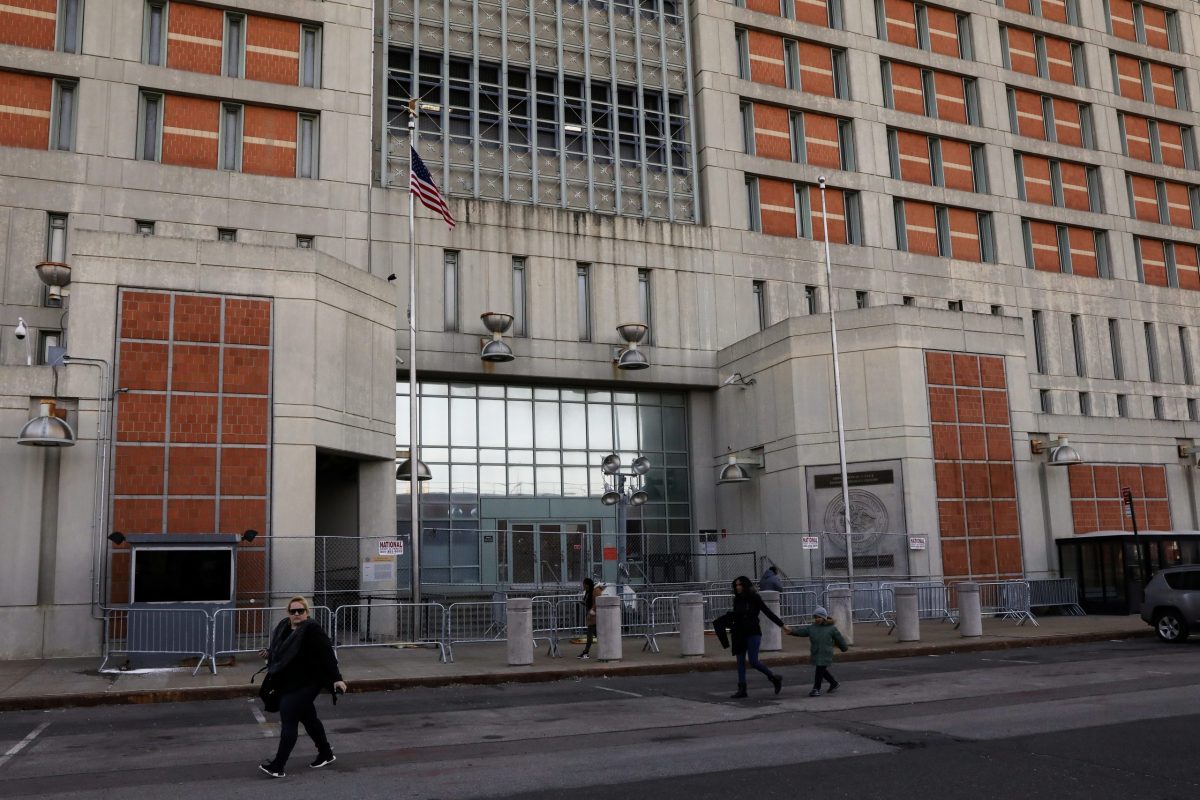 FILE PHOTO:  People are seen exiting the Metropolitan Detention Center, Brooklyn in New York