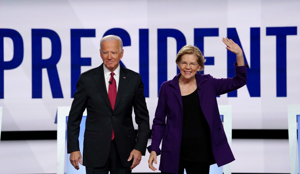 FILE PHOTO: Democratic presidential candidates Biden and Warren pose together in Westerville