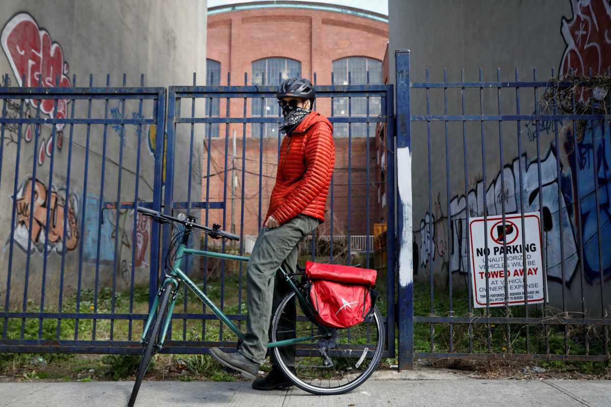 John Donohue, poses for a portrait following an interview, during the outbreak of the coronavirus disease (COVID-19) in the Park Slope section of Brooklyn in New York