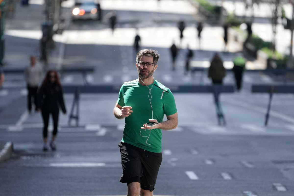 FILE PHOTO: People walk on Park Avenue that was closed to vehicular traffic in New York City