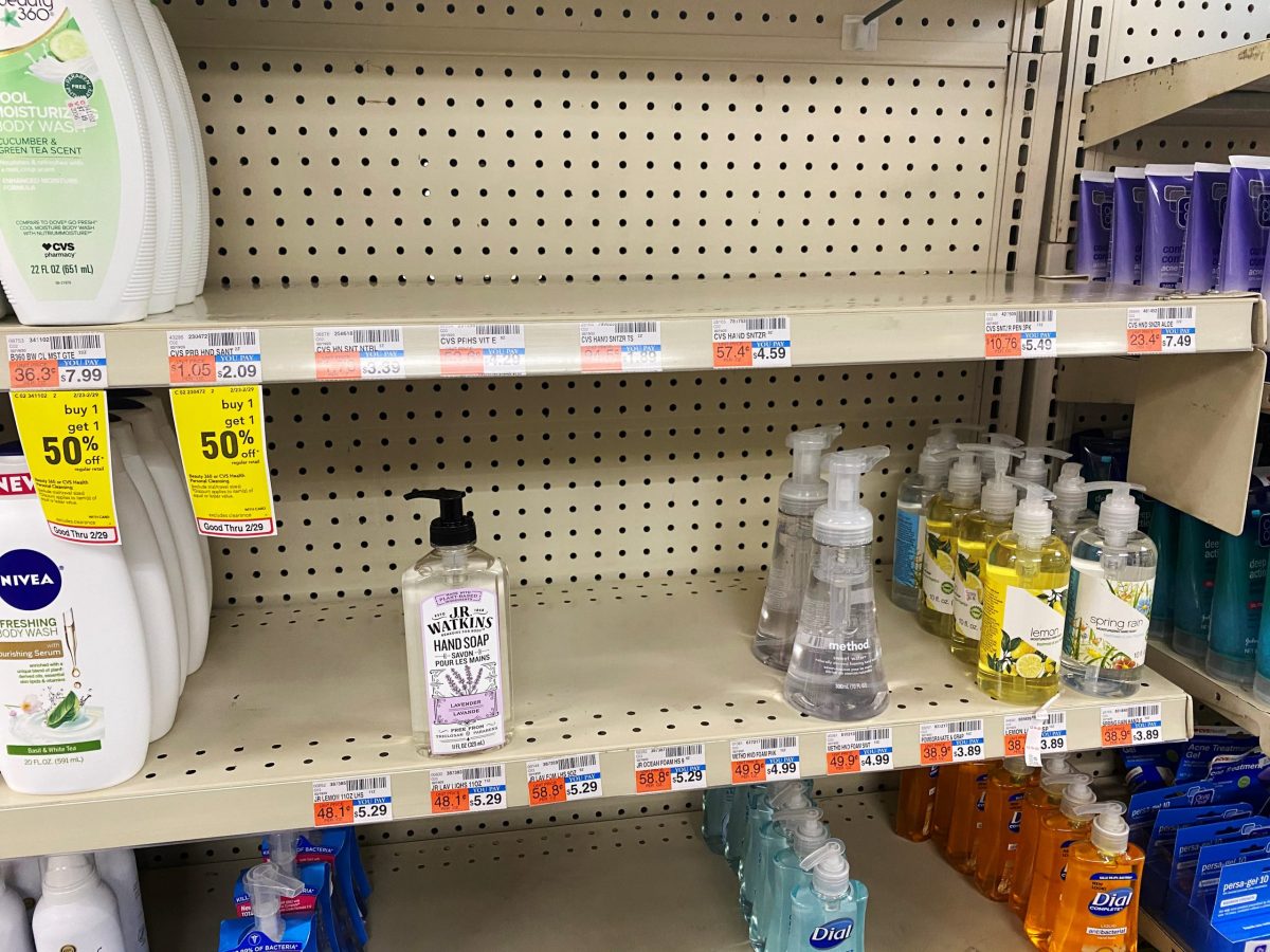 Shelves of a CVS pharmacy are stripped of hand sanitizer in New York