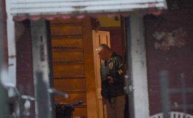 Crime Scene  Unit investigaters inside house at 32 Pulaski Street in Bedford Stuyvesant.