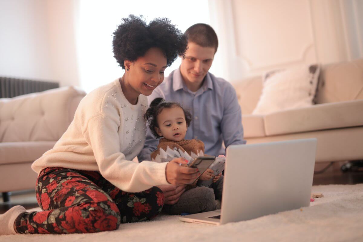 photo-of-woman-using-smartphone-while-sitting-near-her-baby-3820159-1200×800