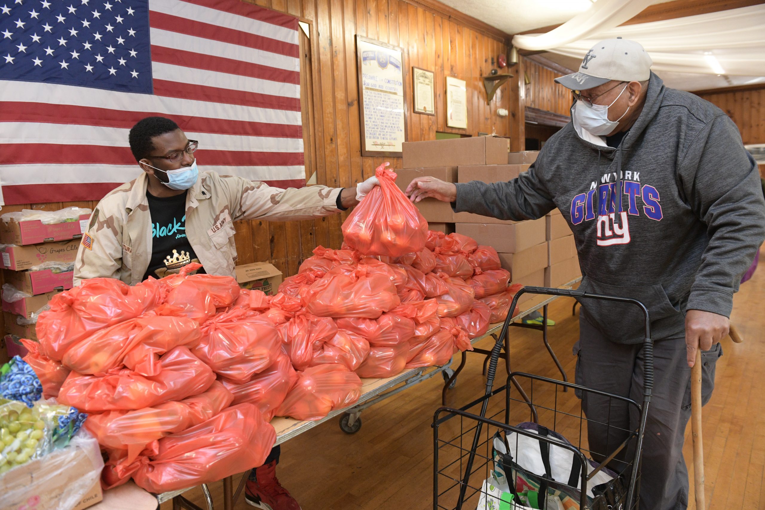 Queens American Legion volunteers distribute food to hundreds of hungry 2