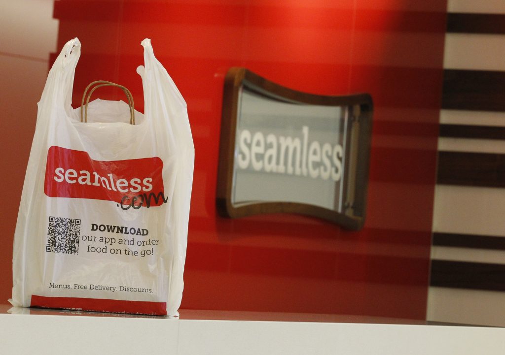 A take-out bag waits on the reception desk at the offices of Seamless in New York