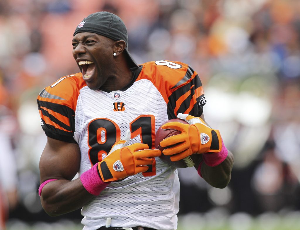 Bengals receiver Owens laughs while warming up prior to his NFL football game against the Browns in Cleveland
