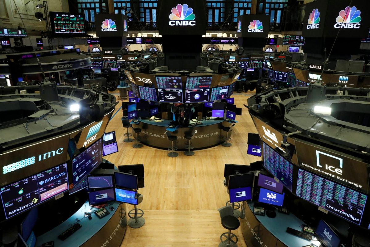 FILE PHOTO: Floor traders work space is seen on the trading floor after the closing bell, following traders positive for Coronavirus disease (COVID-19), at the NYSE in New York
