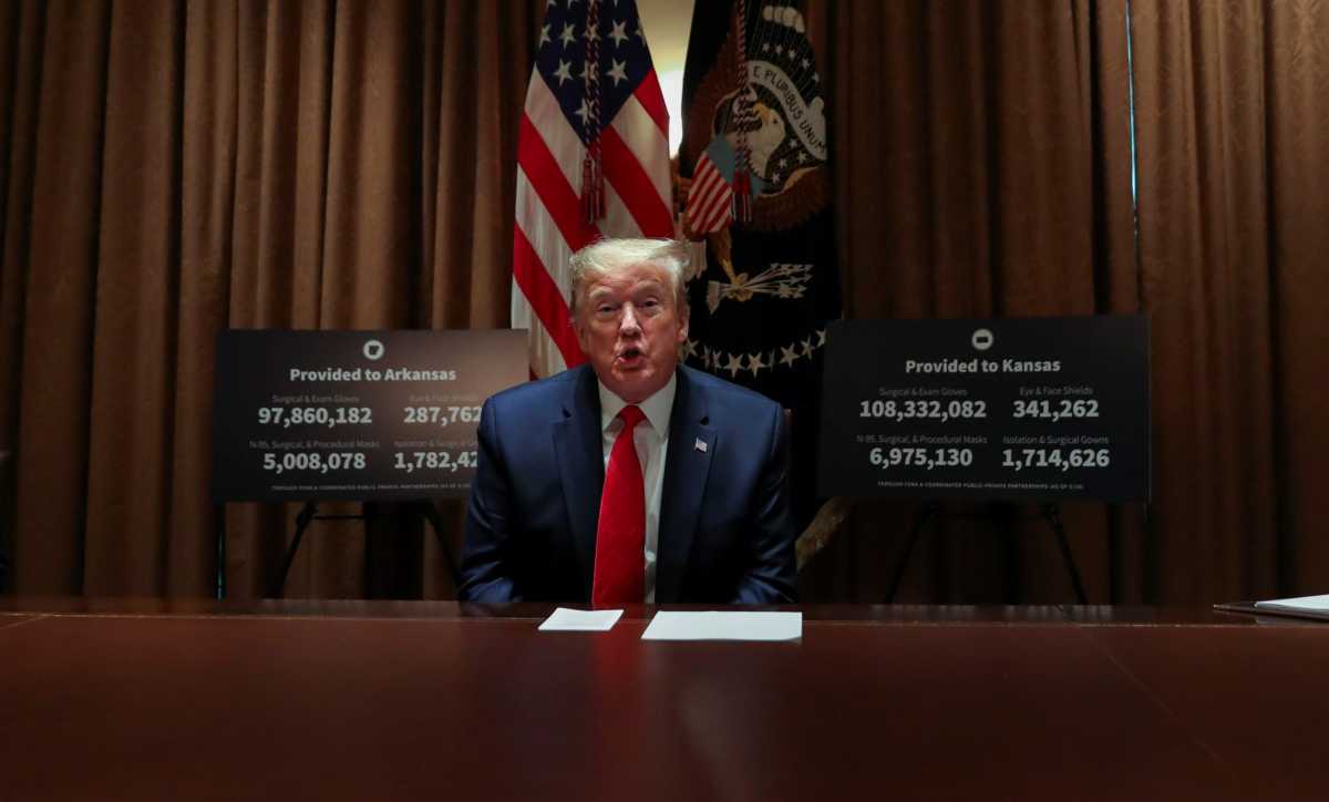 FILE PHOTO:  U.S. President Trump holds coronavirus response meeting with Governors Hutchison and Kelly at the White House in Washington