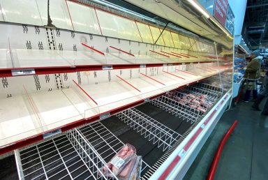 FILE PHOTO: A near empty meat shelf is seen several minutes after the morning opening at a BJ’s Wholesale Club market at the Palisades Center shopping mall in West Nyack
