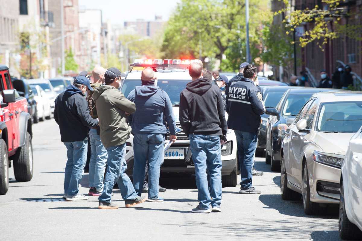 Polce investigate a shooting in the rear of 1550 Sterling Place