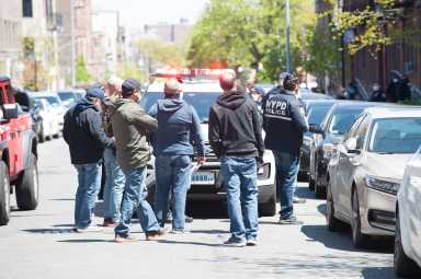 Polce investigate a shooting in the rear of 1550 Sterling Place