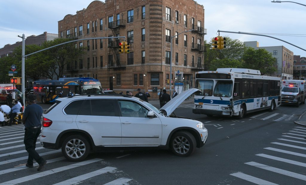 A B-12 bus struck a BMW at East New York Avenue and East 98 Street. Photo by Lloyd Mitchell