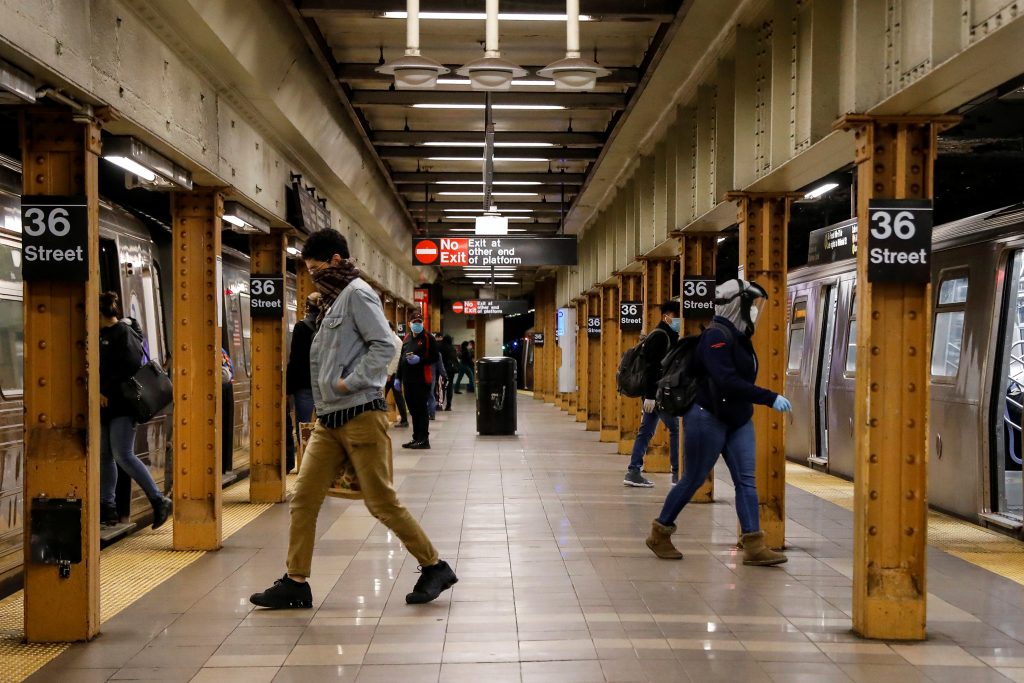 Morning commuters are seen at the subway station, during the outbreak of the coronavirus disease (COVID-19) in Brooklyn, New York