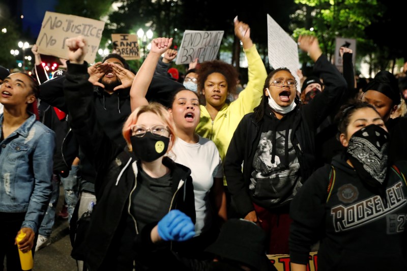 FILE PHOTO:  Protesters rally against the death in Minneapolis police custody of George Floyd, in Portland