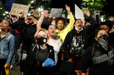 FILE PHOTO:  Protesters rally against the death in Minneapolis police custody of George Floyd, in Portland