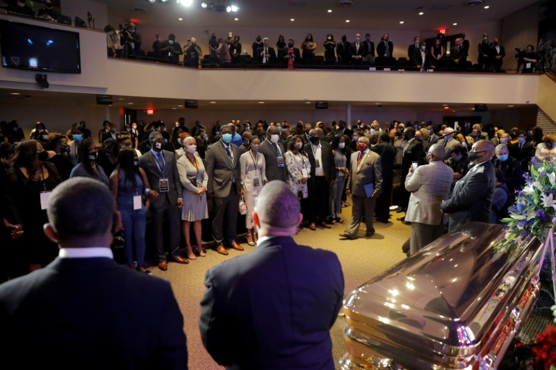 People attend a memorial service for George Floyd following his death in Minneapolis police custody, in Minneapolis