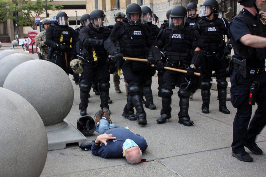 Martin Gugino lays on the ground after he was shoved by two Buffalo, New York, police officers during a protest against the death in Minneapolis police custody of George Floyd in Buffalo, New York