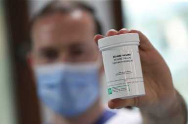 A pharmacist displays a box of Dexamethasone at the Erasme Hospital amid the coronavirus disease (COVID-19) outbreak,  in Brussels