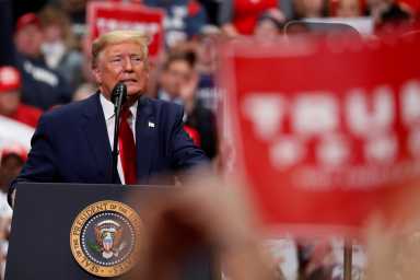 FILE PHOTO: U.S. President Donald Trump speaks at a campaign rally in Charlotte