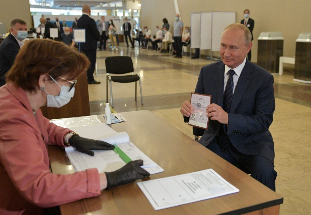 Russian President Putin visits a polling station during a nationwide vote on constitutional reforms in Moscow