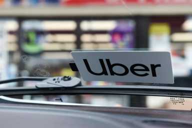 FILE PHOTO: An Uber sticker is seen on Margaret Bordelon’s car in Lafayette, Louisiana