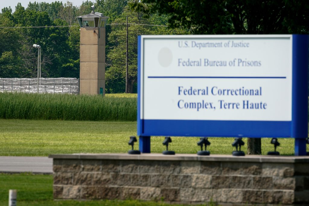 FILE PHOTO: A correction officer keeps watch from a tower at The Federal Corrections Complex in Terre Haute