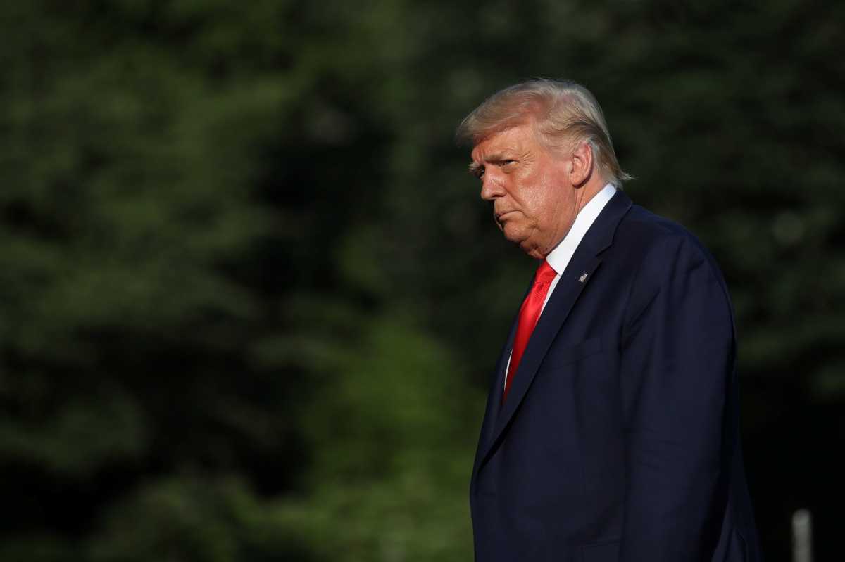 FILE PHOTO: U.S. President Trump arrives on the South Lawn of the White House in Washington
