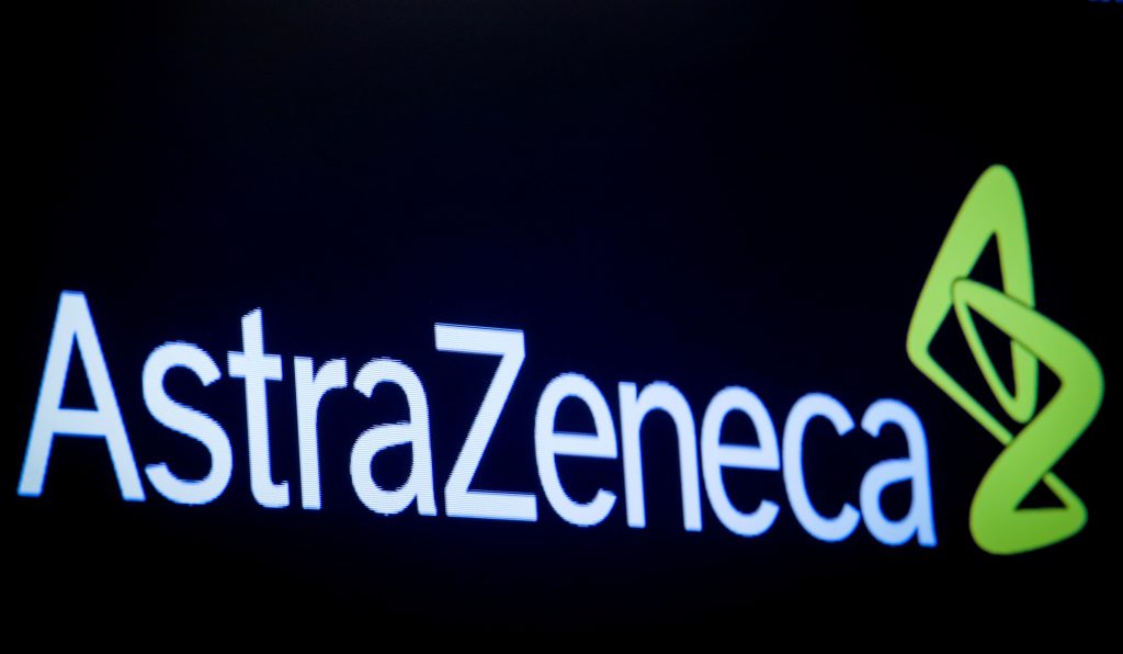 FILE PHOTO: The company logo for pharmaceutical company AstraZeneca is displayed on a screen on the floor at the NYSE in New York