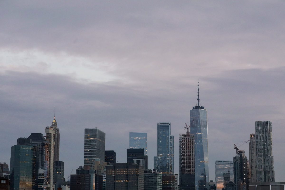 FILE PHOTO: The skyline of lower Manhattan is seen before sunrise in New York