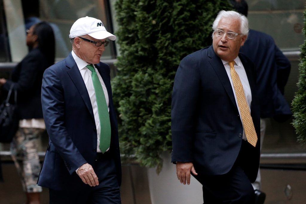 FILE PHOTO: New York Jets owner Robert Wood “Woody” Johnson arrives at Le Cirque restaurant with others before fundraising event for Republican presidential candidate Donald Trump in New York
