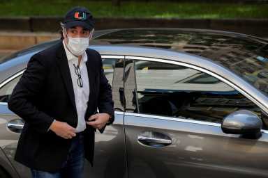 FILE PHOTO: Michael Cohen, the former personal lawyer for U.S. President Donald Trump arrives at his Manhattan apartment after being released from federal prison to serve the remainder of his sentence under home confinement in New York