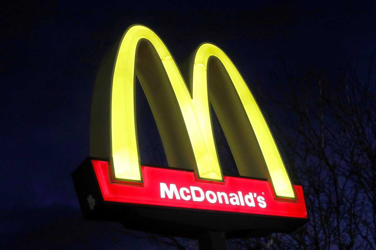 FILE PHOTO: A sign is seen at a McDonald’s restaurant in Queens, New York